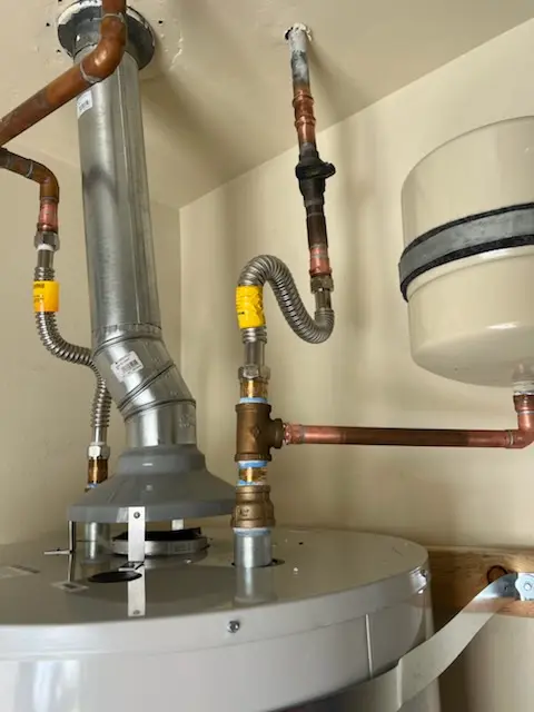 Water heater installation and plumbing repair in University